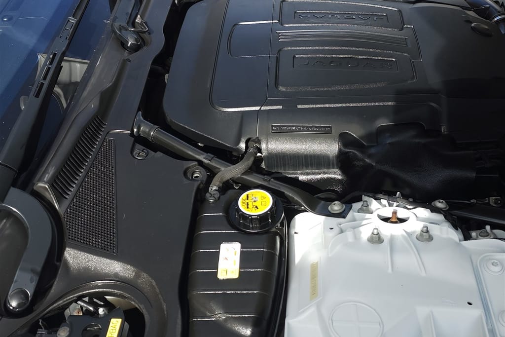 Jaguar engine bay after detailing