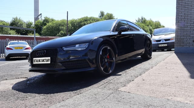 Black Audi A7 paintwork after machine polishing removed wash scratches