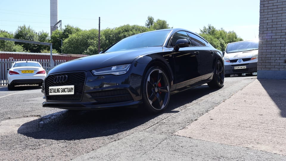 Black Audi A7 Sportback gloss after machine polishing