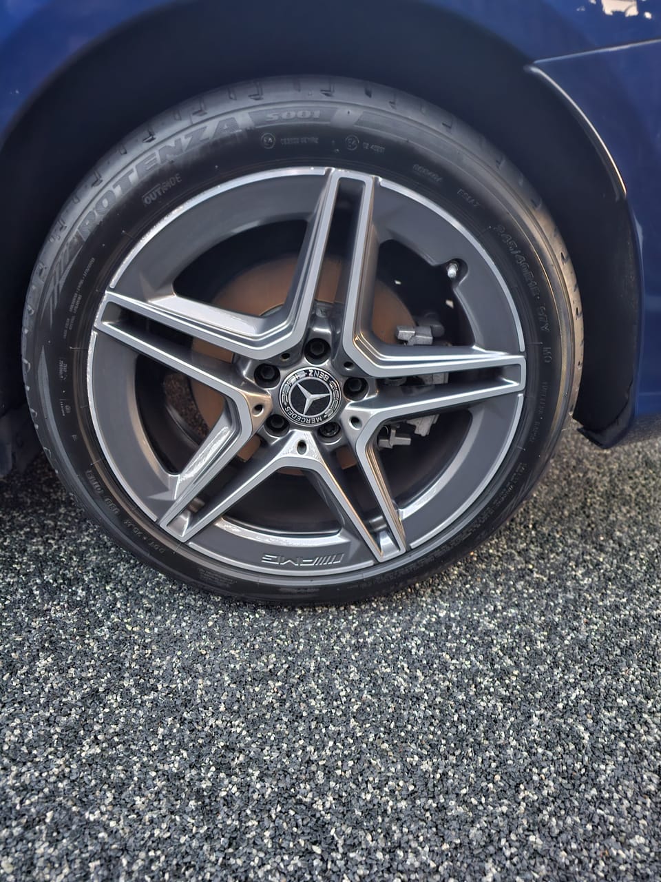 AMG alloy wheel cleaned of bonded brake dust