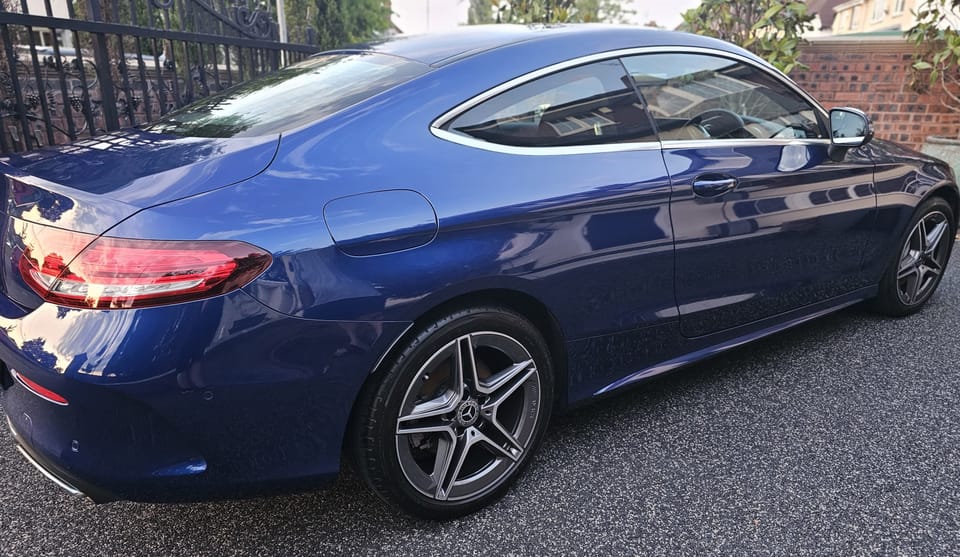 Blue Mercedes C300 Coupe kept on a maintenance plan