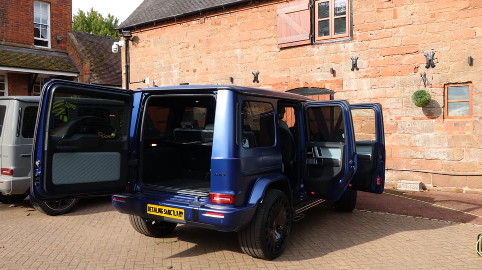Black exterior plastic trim restored on a Mercedes G63