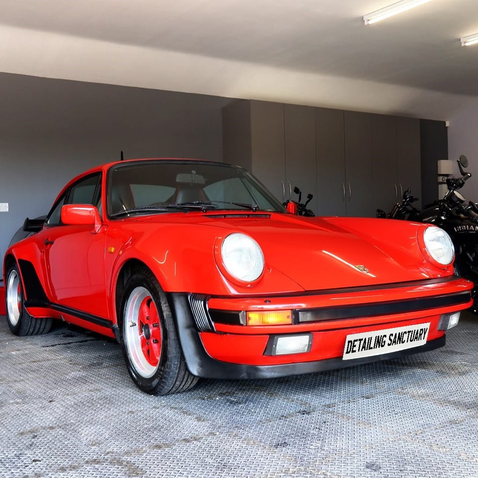 Classic Porsche 911 Carrera detailed in a garage near Telford