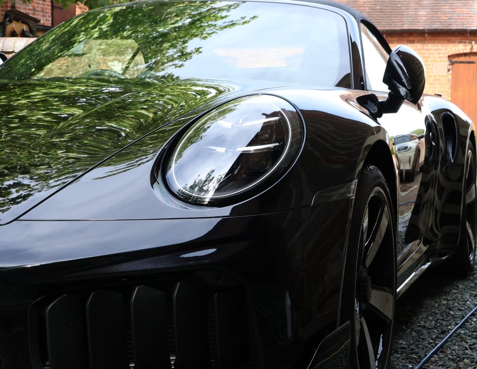 Black Porsche paintwork after two-stage paint correction in Wolverhampton