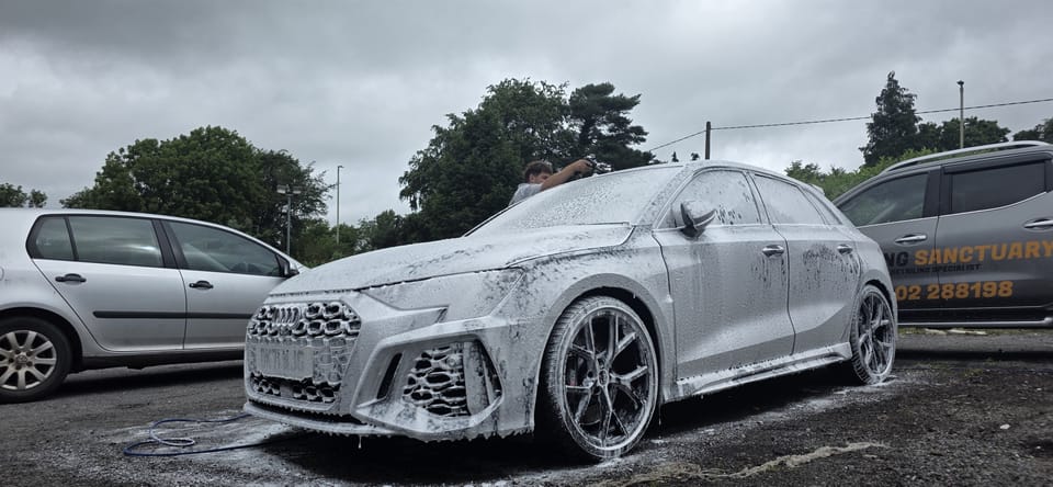 Van being foam washed on site during a fleet valet
