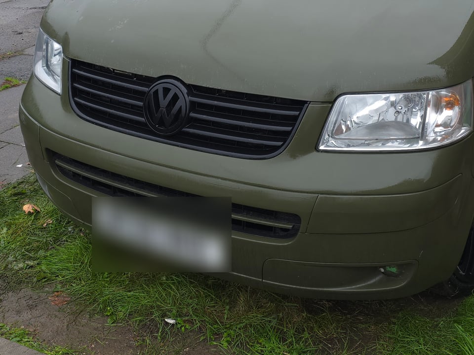 The finished VW Transporter T5 front end in Wolverhampton, both restored headlights clear and matching