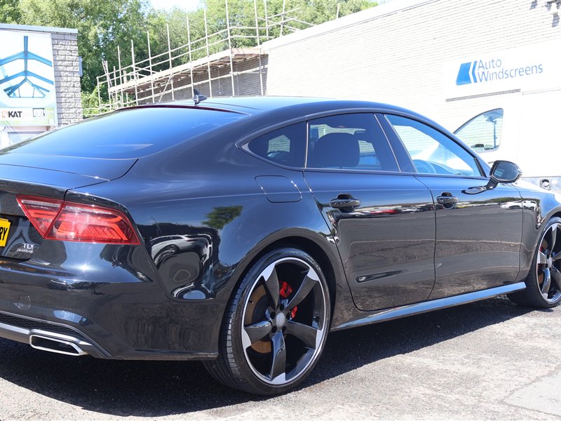 Black Audi A7 Sportback front end with swirl marks removed