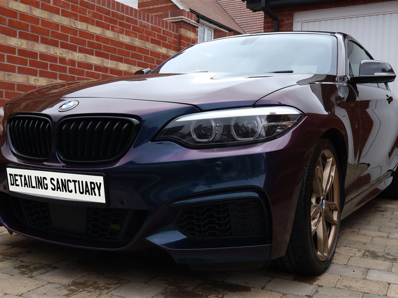BMW M240i side profile after a full mobile detail