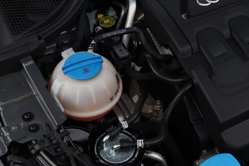 Audi coolant expansion bottle and caps cleaned by hand