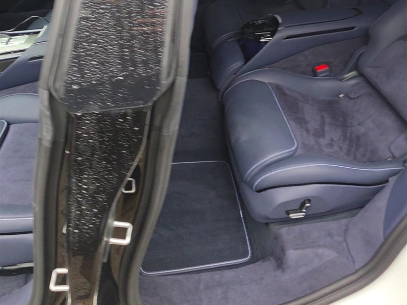 Ferrari Purosangue rear seat in dark blue leather and Alcantara after an interior detail
