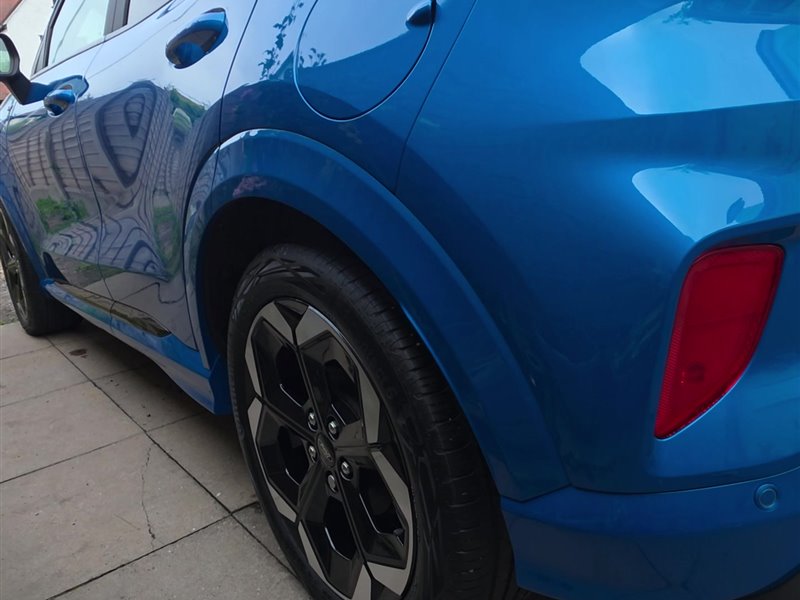 Blue Ford Puma ST-Line rear three-quarter view after a ceramic coating