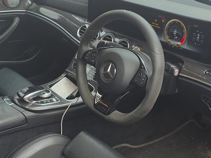 Mercedes E-Class centre console and steering wheel before an interior deep clean