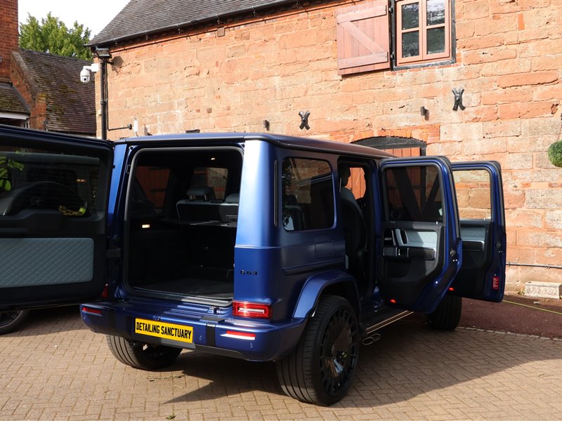 Mercedes-AMG G63 with doors open after a full detail
