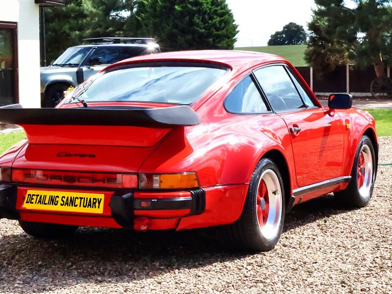 Classic Porsche 911 Carrera side profile after detailing