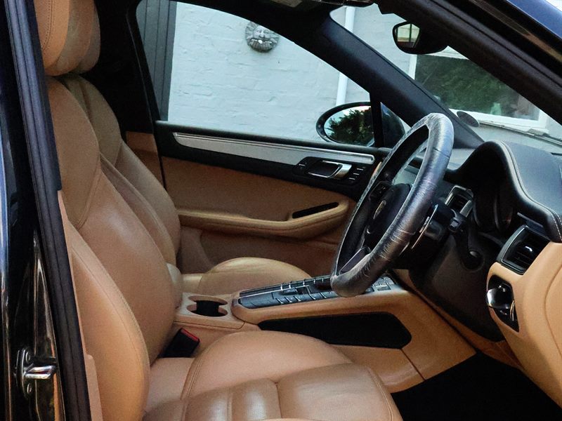 Porsche Macan tan leather interior after an interior deep clean