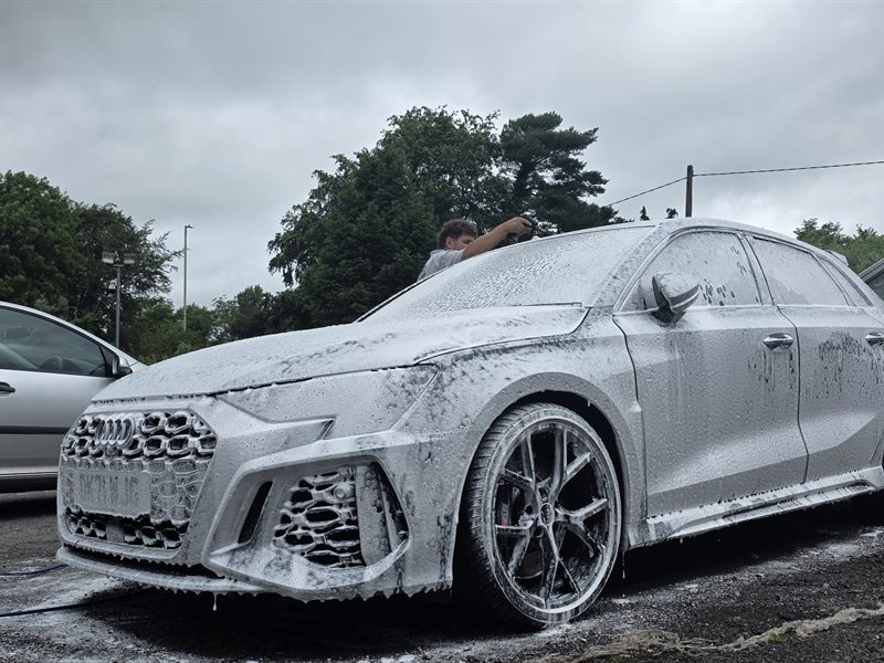 Snow foam pre-wash removing Chase dust before contact washing