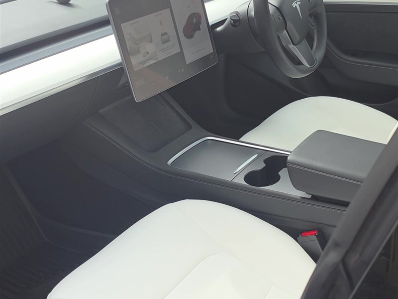 Tesla Model 3 white interior and centre console after an interior deep clean
